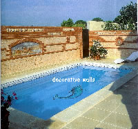 decorated walls around a pool