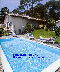 rectangular pool with corner roman steps