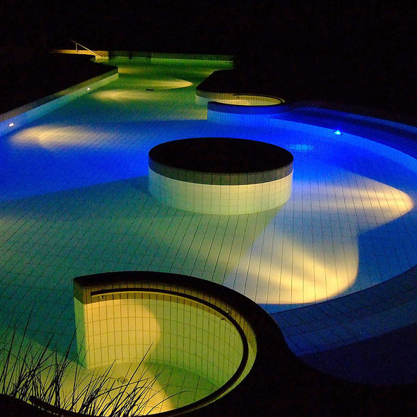 Outdoor Pool with LED lights at night
